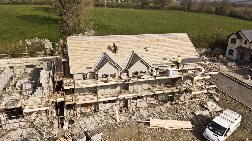 Aerial Photo Of Brown 3-story House